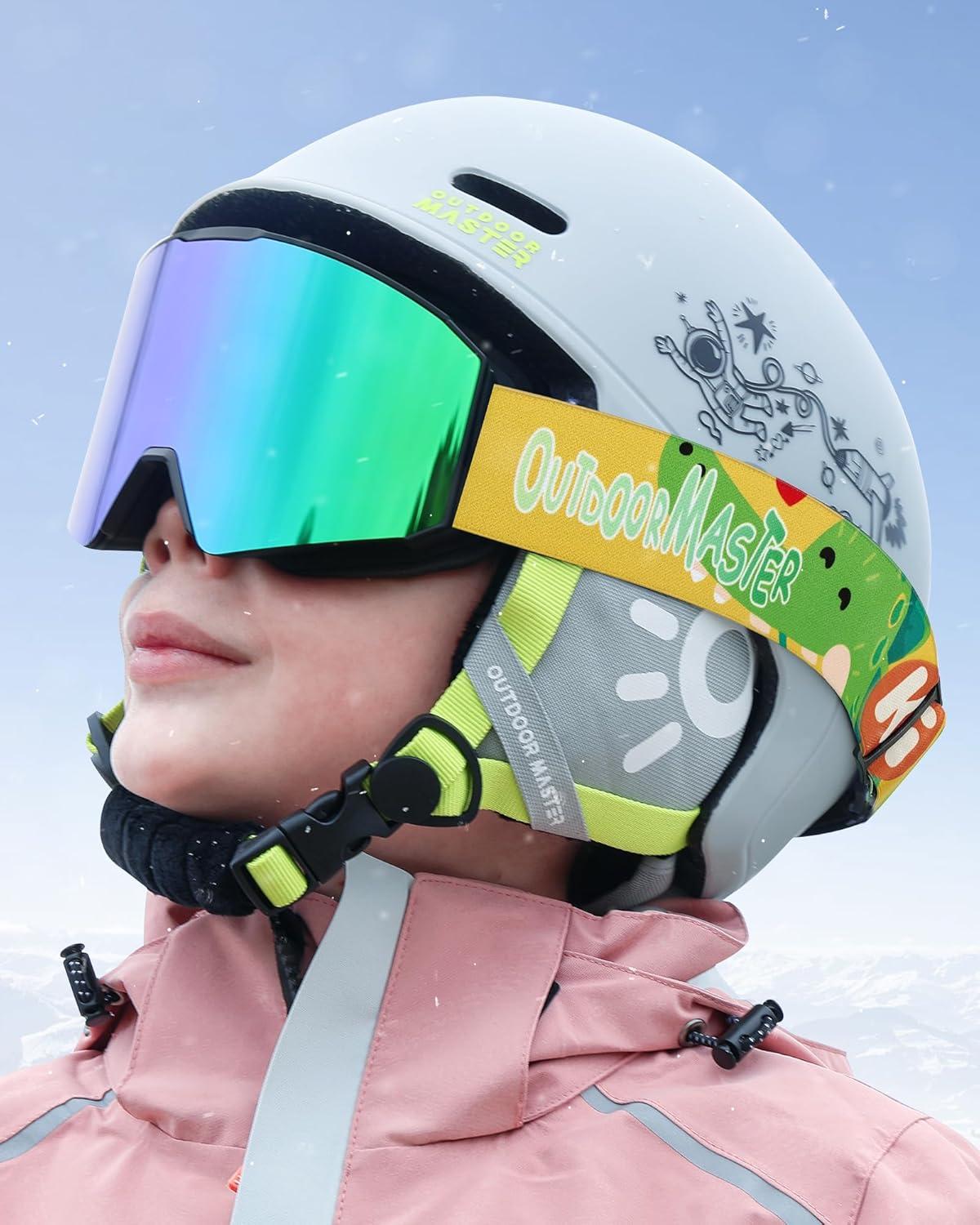 imageOutdoorMaster Falcon Kids Ski GogglesMagnetic Interchangeable Lens Anti Fog UV Protection OTG Snowboard Goggles for YouthA1vlt 17 Grey Lens With Revo Greendinosaur Strap