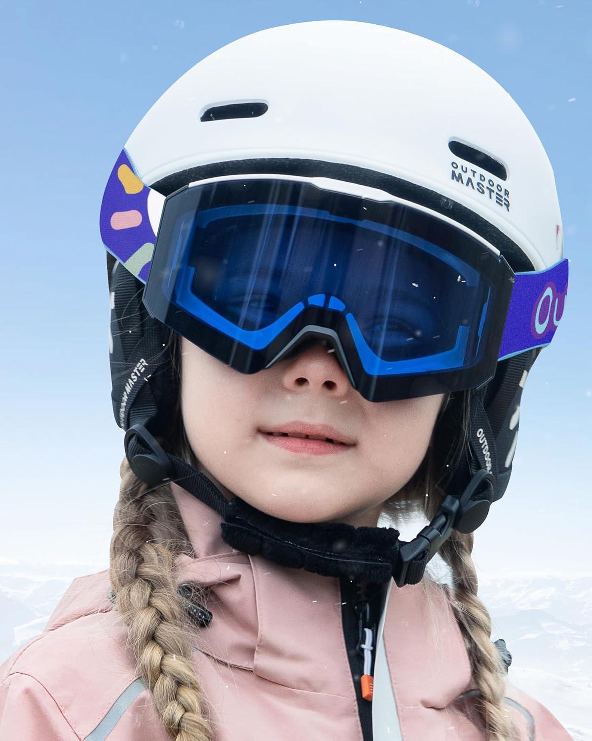 imageOutdoorMaster Falcon Kids Ski GogglesMagnetic Interchangeable Lens Anti Fog UV Protection OTG Snowboard Goggles for YouthA1vlt 28 Dark Blue Lenssun Strap