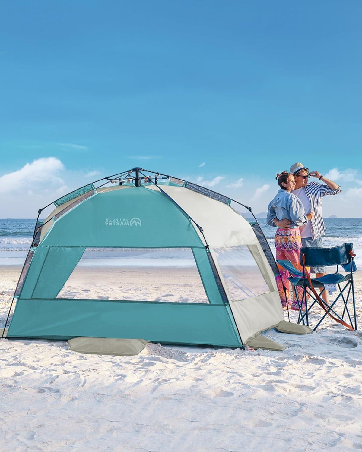 imageOutdoorMaster Beach Tent Sun Shelter for 34 Person Pop Up Beach Tent Easy Setup with Sandbags Portable Sun Shade Canopy with Carrying Bag for Beach ampamp Outdoor UPF50 UV Protection Family SizeCancun Seashore