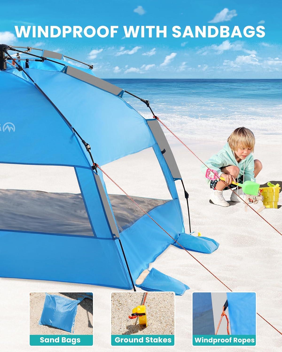 imageOutdoorMaster Beach Tent with Blackout Shelter Technology Portable Sun Shade Shelter 4 Person Pop Up Beach Tents with UPF 50 UV Protection 95mm Thick Pole 3 Ventilating Mesh Windows GreenBlue