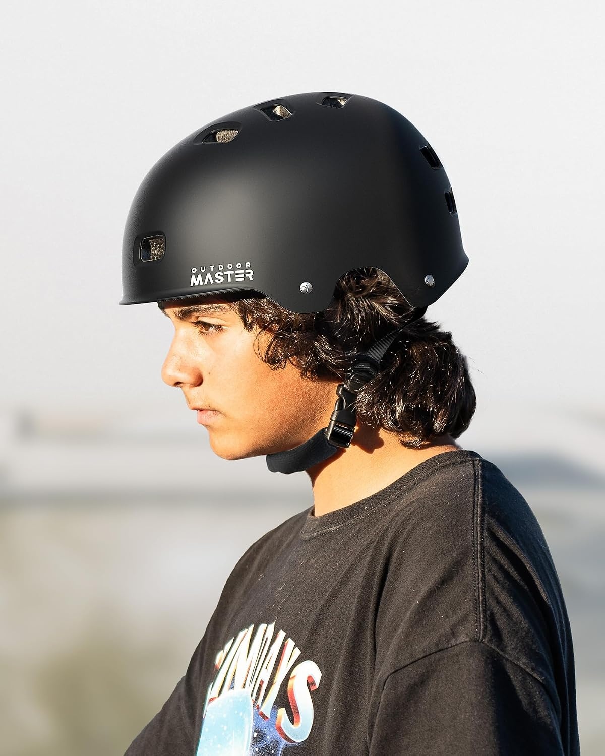 image:imageOutdoorMaster Beetles Snug Skateboard Bike Helmet for Adults Youth Two Removable Liners Ventilation Certified MultiSport Helmet for Cycling Commuter Scooter Roller Skating LongboardA Carbon Black